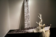 BATTLE OF LOSERS AND LOVERS_______plastic soldiers, chocolate, wood, iron cast deer / 250X 250x 320 cm