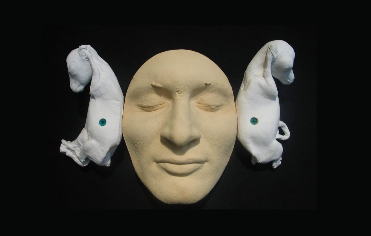 THE LISTENER_______plaster self-portrait with goats fetuses / 1999