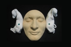 THE LISTENER_______plaster self-portrait with goats fetuses / 1999
