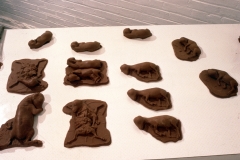 CHOCOLATE SOLILOQUY_______chocolate fetal goat casts, dried goat ears, alarm clock dipped in chocolate/ 1989