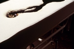SLEEPING WITH CHOCOLATE_______autopsy table a self-contained unit, where chocolate is pumped to the surface and returns through a middle drain/ 1996