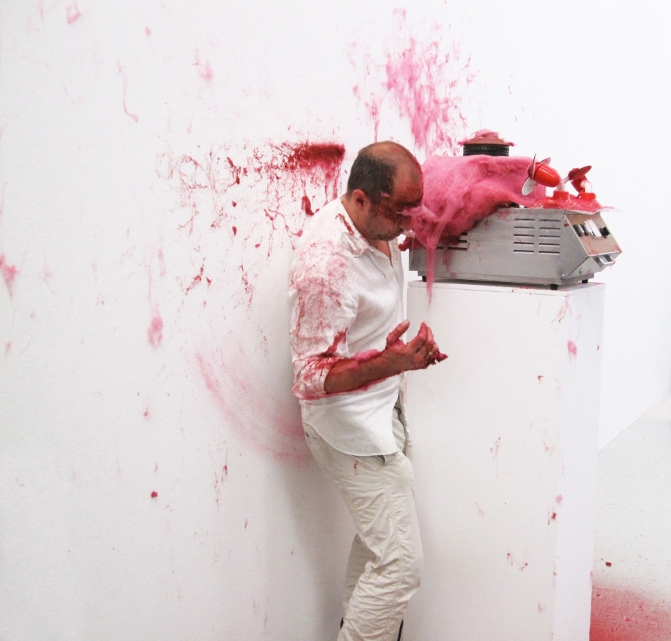 SLAPPED IN THE FACE TILL YOUR SHIT TURNS RED_______performance, cotton candy machine/ 2009 / CAN, Centre d'Art Neuchâtel, Switzerland