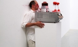 SLAPPED IN THE FACE TILL YOUR SHIT TURNS RED_______performance, cotton candy machine/ 2009 / CAN, Centre d'Art Neuchâtel, Switzerland