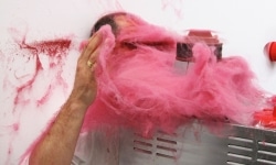 SLAPPED IN THE FACE TILL YOUR SHIT TURNS RED_______performance, cotton candy machine/ 2009 / CAN, Centre d'Art Neuchâtel, Switzerland