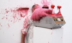 SLAPPED IN THE FACE TILL YOUR SHIT TURNS RED_______performance, cotton candy machine/ 2009 / CAN, Centre d'Art Neuchâtel, Switzerland