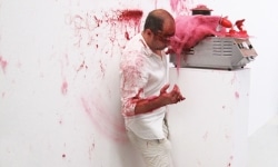 SLAPPED IN THE FACE TILL YOUR SHIT TURNS RED_______performance, cotton candy machine/ 2009 / CAN, Centre d'Art Neuchâtel, Switzerland
