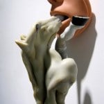 DRIBBLE_______100 x 20 x 18 cm / melted plastic, rubber mask