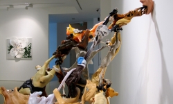 WILD HORSES COULDN'T DRAG ME AWAY_______ 190 x 120 x 130 cm / melted plastic horses, rubber