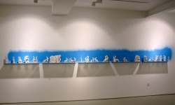 PHARMACEUTICAL LANDSCAPE_______30 x 500 cm / melted pill bottles in the form of Easter bunnies, glass