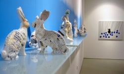 PHARMACEUTICAL LANDSCAPE_______30 x 500 cm / melted pill bottles in the form of Easter bunnies, glass