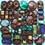 EVISCERATION OF WAITED MOMENTS. AMERICAN MORGUE CHOCOLATES_______impressions from wounds cast in dark chocolate / 44X48X8 cm / 1994 - 2006