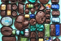 EVISCERATION OF WAITED MOMENTS. AMERICAN MORGUE CHOCOLATES_______impressions from wounds cast in dark chocolate / 44X48X8 cm / 1994 - 2006