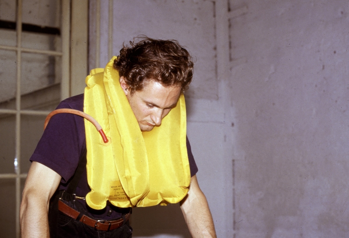REPEATED BLOWS EVENTUALLY DRIVES ALL ANIMALS TO PASTURE_______Life-jacket, shoes, flamingo leg candles / Fodor Museum Amsterdam The Netherlands / 1992