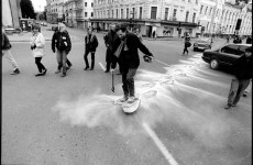 SNOWSHOES_______an ongoing performance, snowshoes containing white flour are leaving marks while walking in different cities / MOSCOW / 1993 —