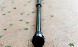 STIPPELBEEN ( POKKA DOT LEG)_______an ongoing walking performance with cane, filled with a mixture of phosphorescent powder and plaster. each placement leaves a lingering green dot / Moscow, Amsterdam, Pittsburgh /1993 —