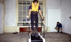 REPEATED BLOWS EVENTUALLY DRIVES ALL ANIMALS TO PASTURE_______Life-jacket, shoes, flamingo leg candles / Fodor Museum Amsterdam The Netherlands / 1992