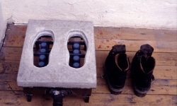 LANDSCAPE WITH INCIDENT_______bronze soled shoes heated to flash point / Oceaan Gallery Arnhem The Netherlands / 1993