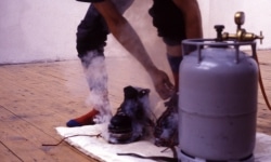 LANDSCAPE WITH INCIDENT_______bronze soled shoes heated to flash point / Oceaan Gallery Arnhem The Netherlands / 1993